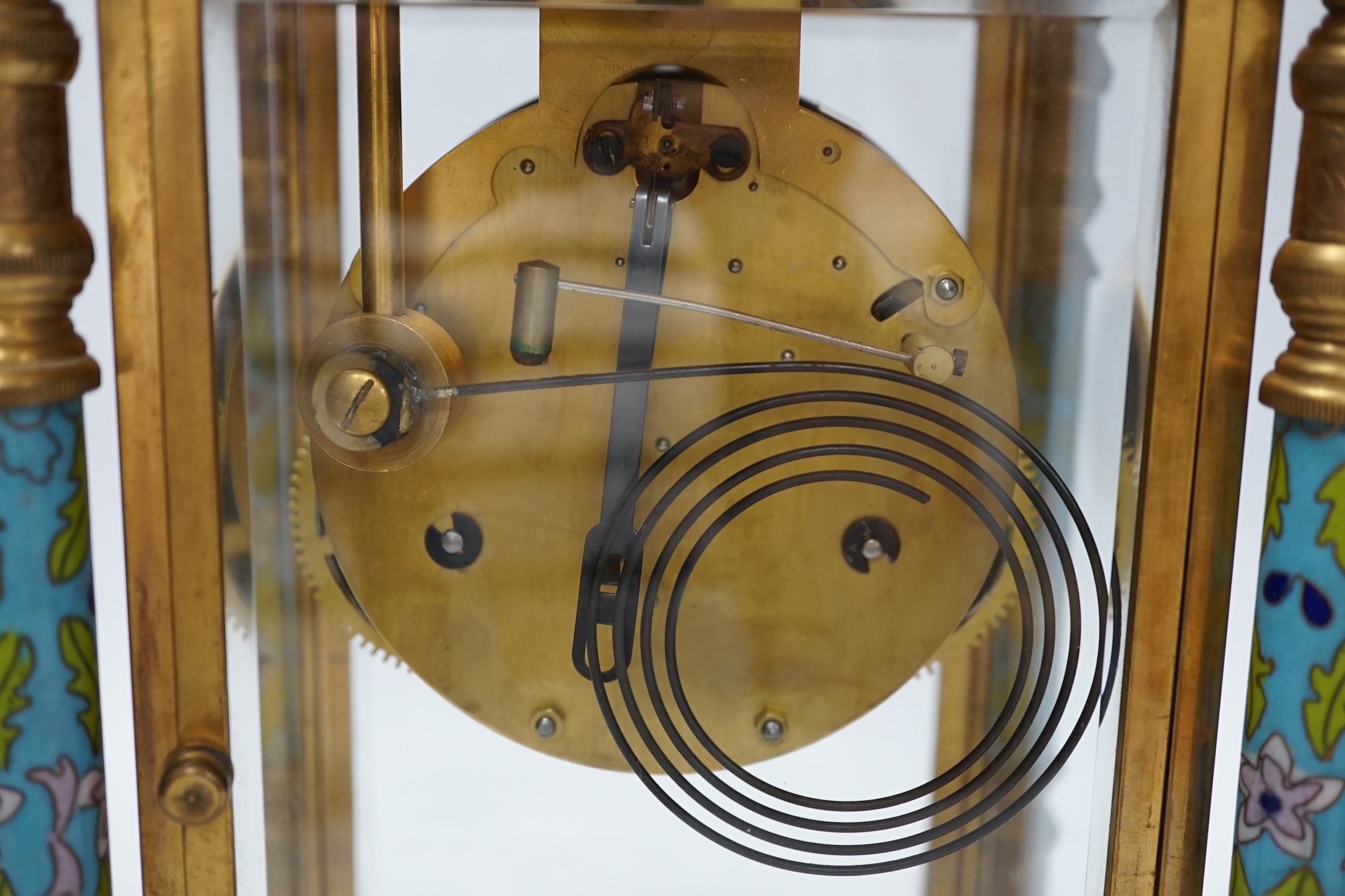 A champlevé four glass and brass mantel clock, with enamel dial, 45cm high